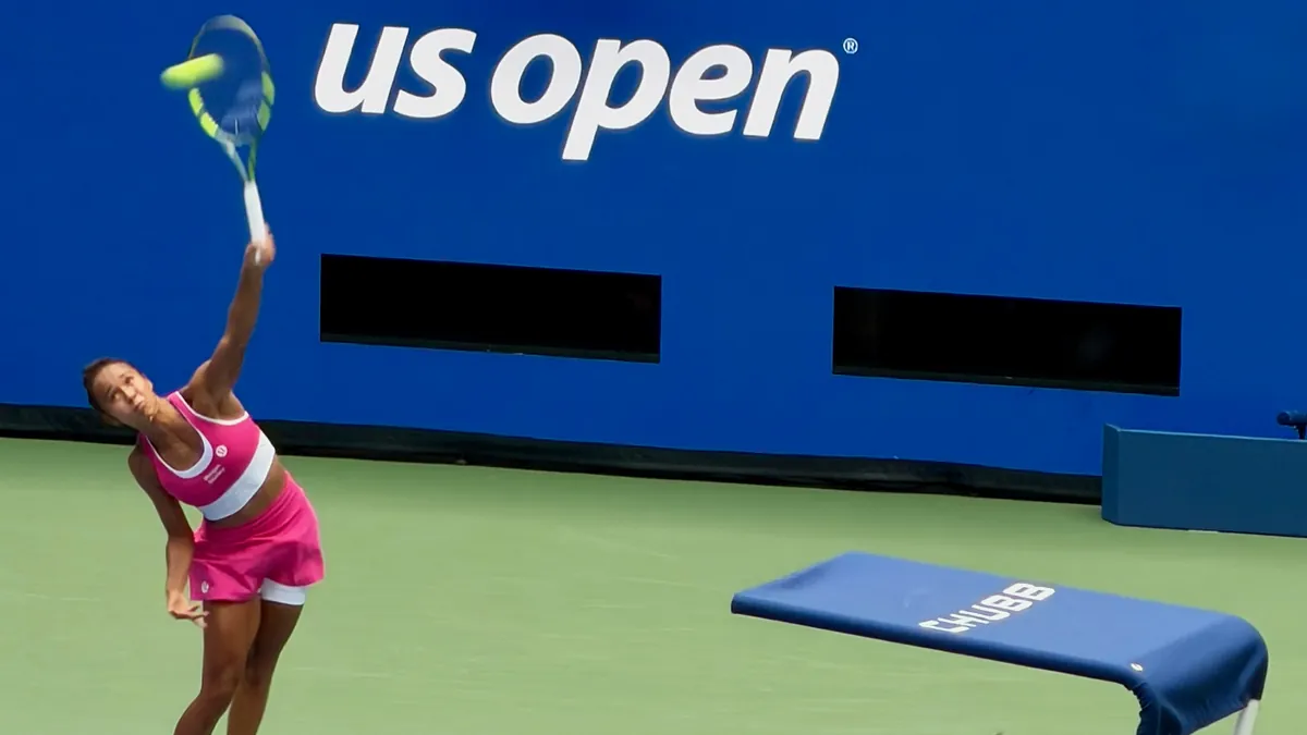 Leylah Fernandez serving on a hard court at the 2026 US Open