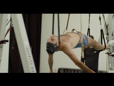 Roger Federer hangs from the ceiling in underwear for art | The Break