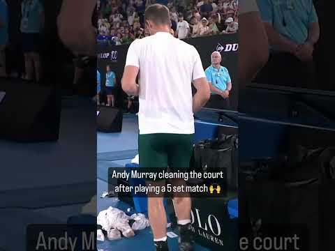 Andy Murray cleaning the court